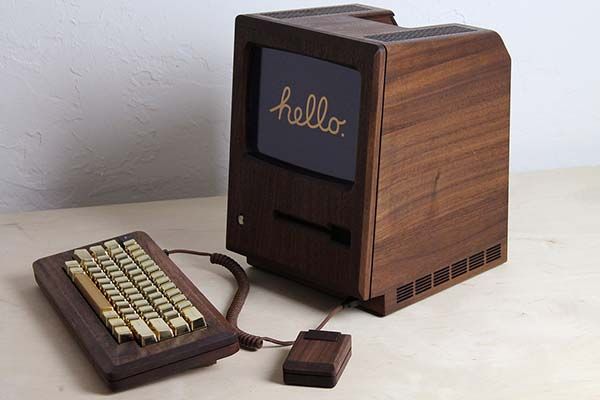 The Macintosh 128k Replica with a Wooden Housing and Gold Keyboard