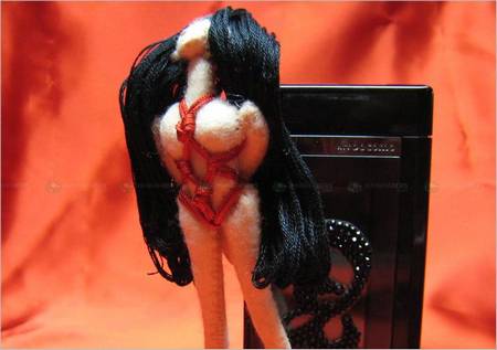 Japanese Bondage Doll Strapped on Your Cell Phone